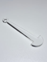 clear plastic mini minder stick on a white background